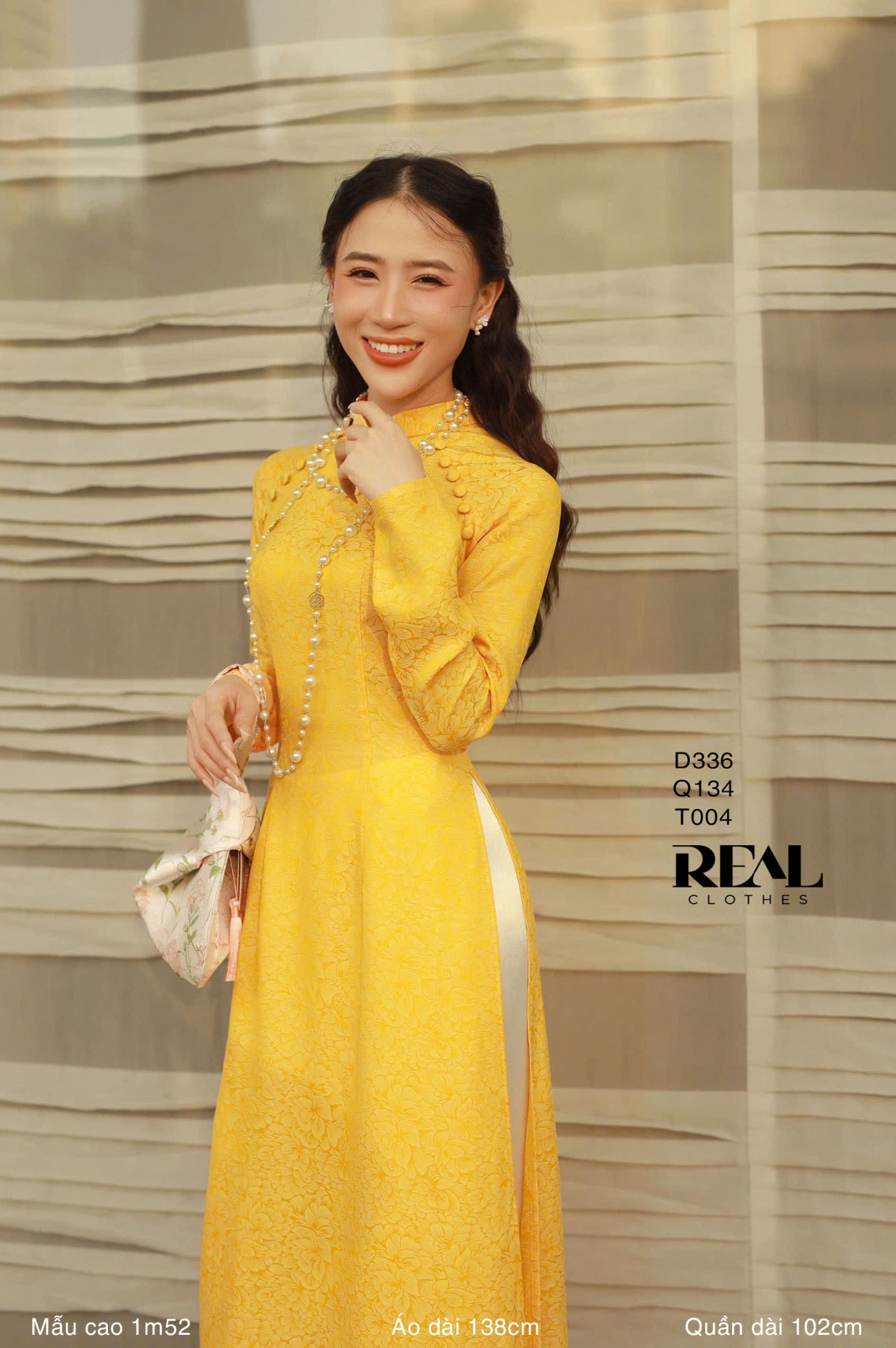 Áo dài truyền thống nhã an vàng tay dài