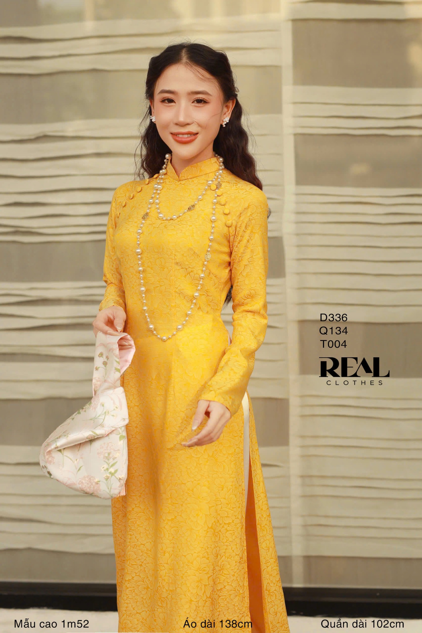 Áo dài truyền thống nhã an vàng tay dài