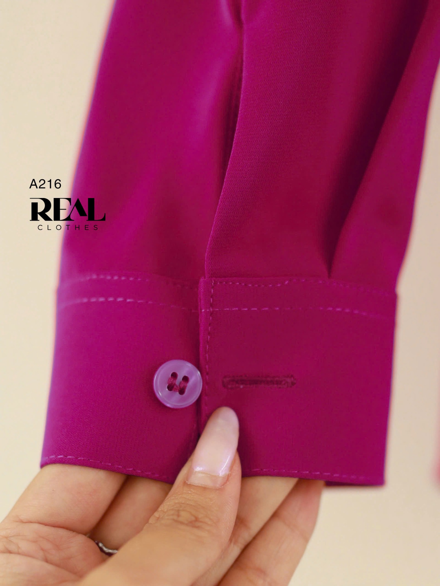 Sơ mi cổ mềm hồng cẩm đính hoa