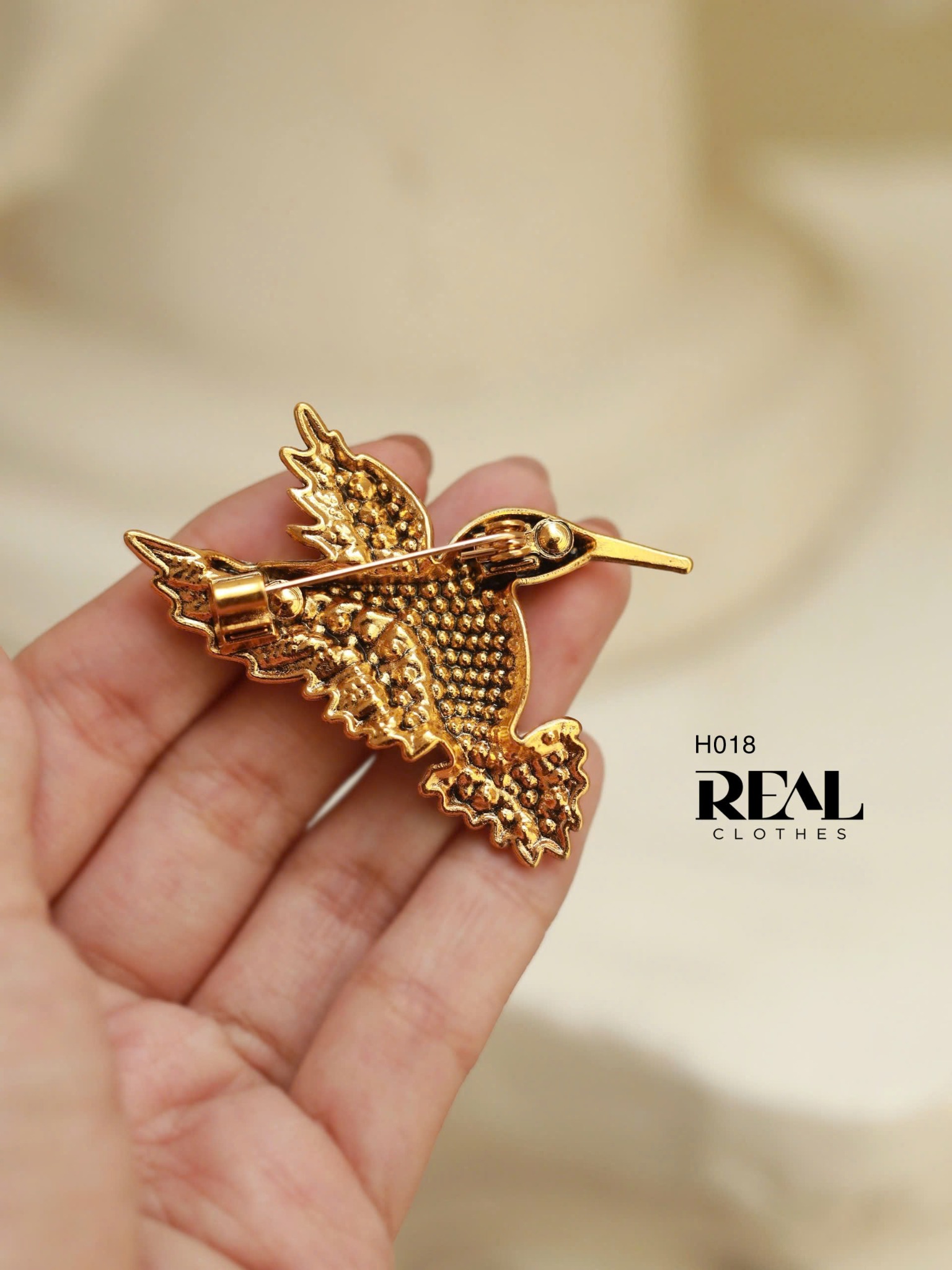 Cài áo chim nhạn