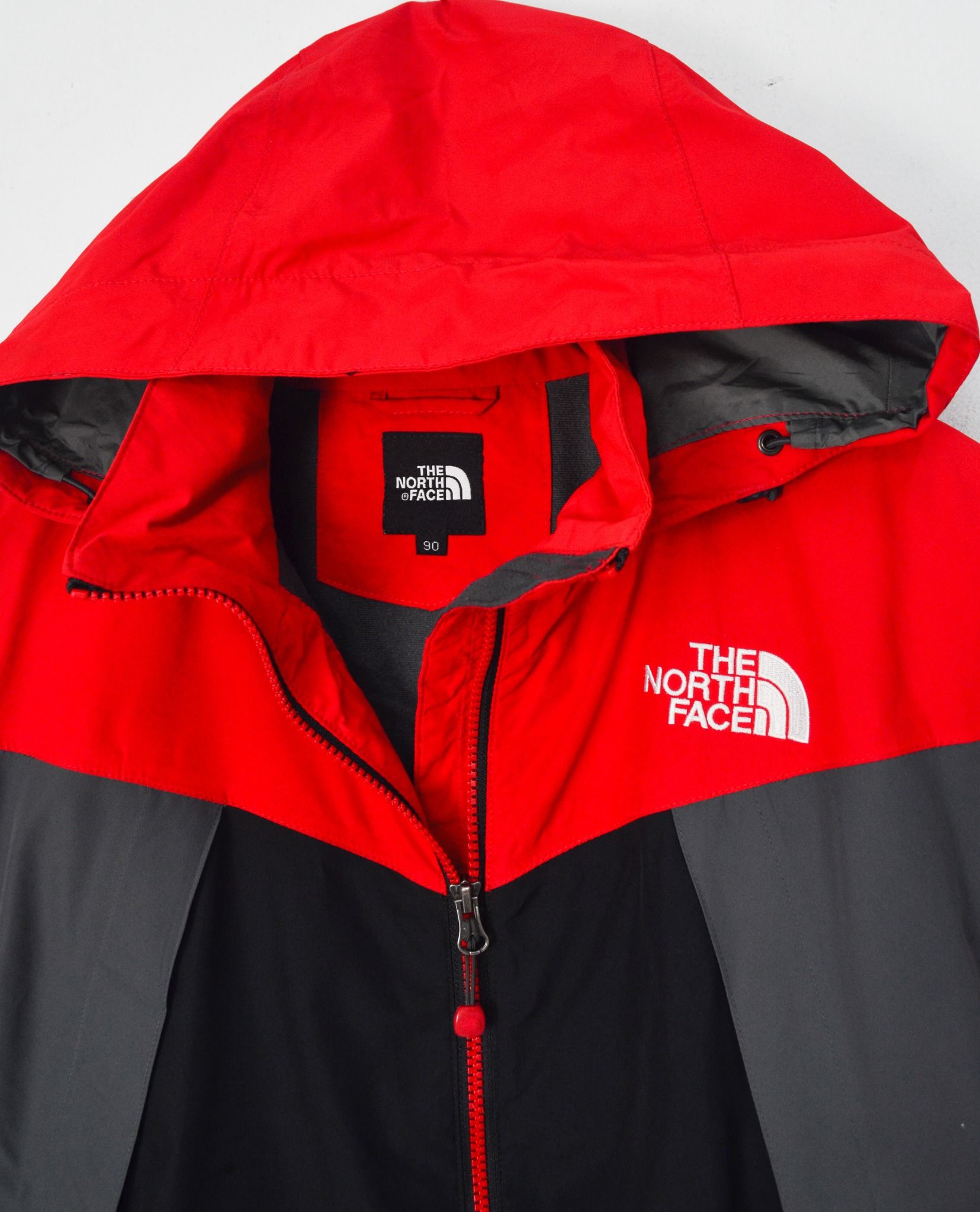 red windbreaker north face