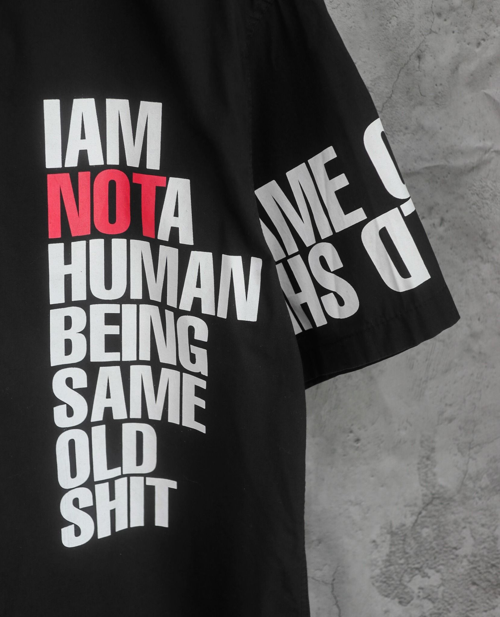  08.18.23 - VTG BUTTON UP SHIRT - IAM NOT A HUMAN BEING 