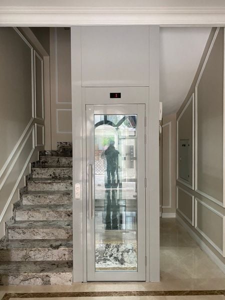 THANG HOMELIFT H103 - CỬA BẢN LỀ MỞ TAY