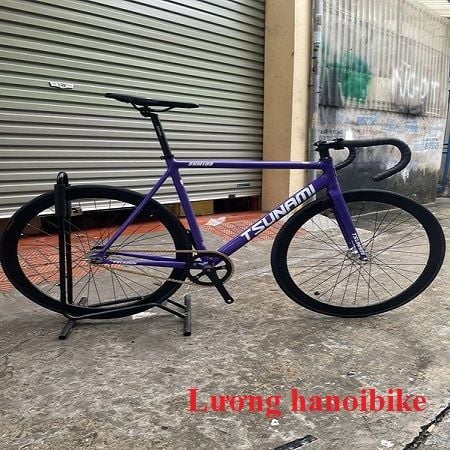 Xe đạp Fixed gear Tsunami SNM100 Tím cơ bản tay cong