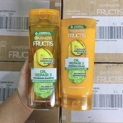 Bộ dầu gội  và xả Garnier Fructics Oil Repair 3 từ Bơ và tinh dầu dừa, oliu