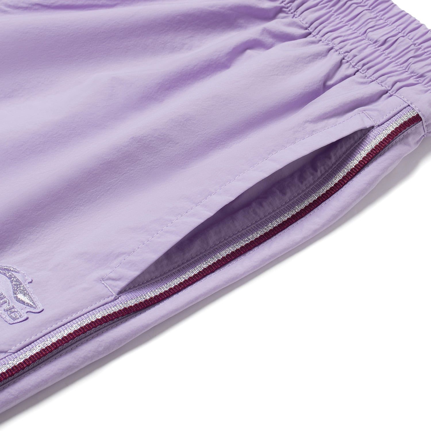 Quần gió thể thao Li-Ning nữ AYKS774-2