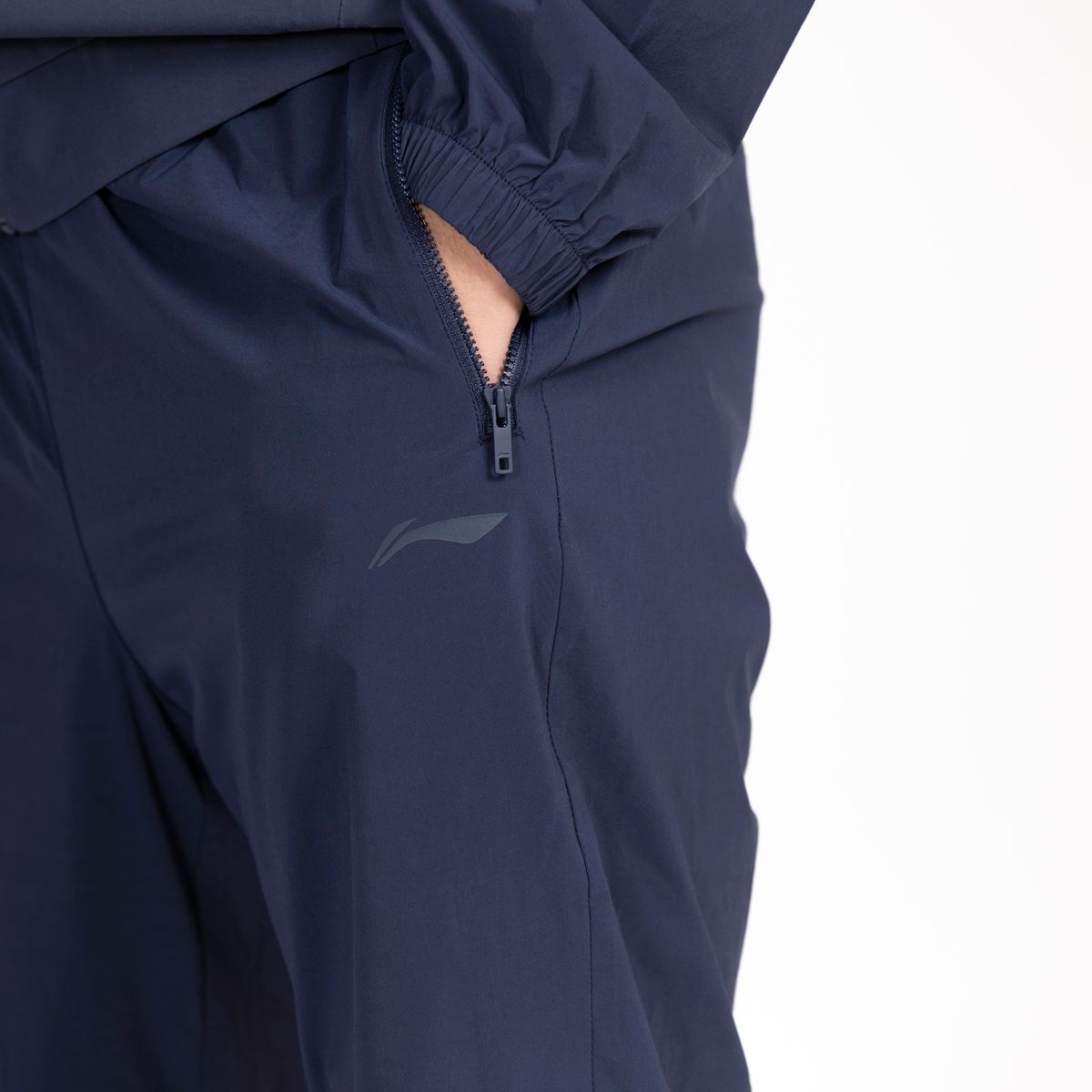 Quần gió Li-Ning Nam AYKT749-1