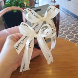  Kẹp tóc và cột tóc nơ lớn Chanel xinh xắn 