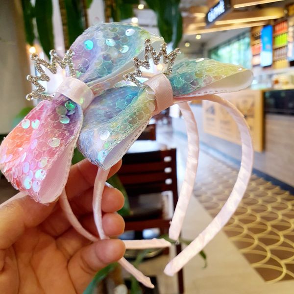  Cài tóc vương miện nơ kim sa cầu vồng lung linh cho bé 