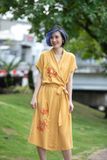  Đầm thêu tay Cúc Quỳnh vàng mustard WarpDress 