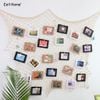 Lưới dây thừng trang trí treo ảnh kèm khung ảnh giấy và kẹp gỗ decor tường