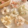 buoc-toc-scrunchies-2-lop-vai-voan-c-ch135-ngau-nhien