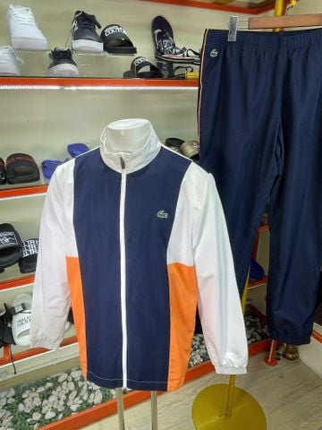 Bộ Áo Quần Lacoste Trắng Cam Xanh Vải Dù - New - WH0877 51 8TY - PA05