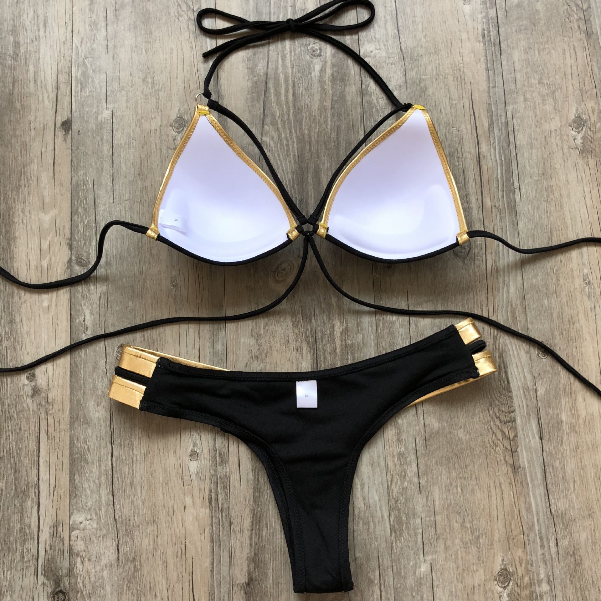 Bộ bikini 2 mãnh đen viền vàng – Gạo Accessories