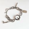 Đồng hồ thời trang Gucci G Charm mặt trắng