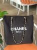 Túi dây da tote Chanel canvas