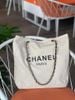 Túi dây da tote Chanel canvas