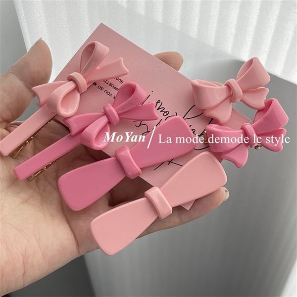  Kẹp bấm nơ cứng tone hồng 