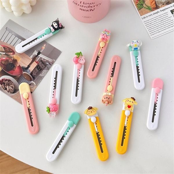  Dao rọc giấy đính charm 