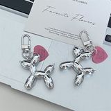  Móc khoá mini cún bóng ánh bạc 