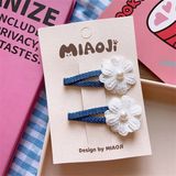  Set 2 kẹp tóc vải bò xanh hoa trắng 