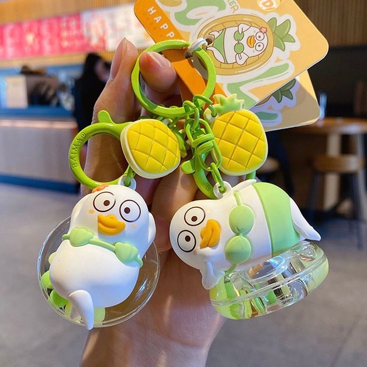  Móc khoá Duckyo bikini xanh nằm phao 