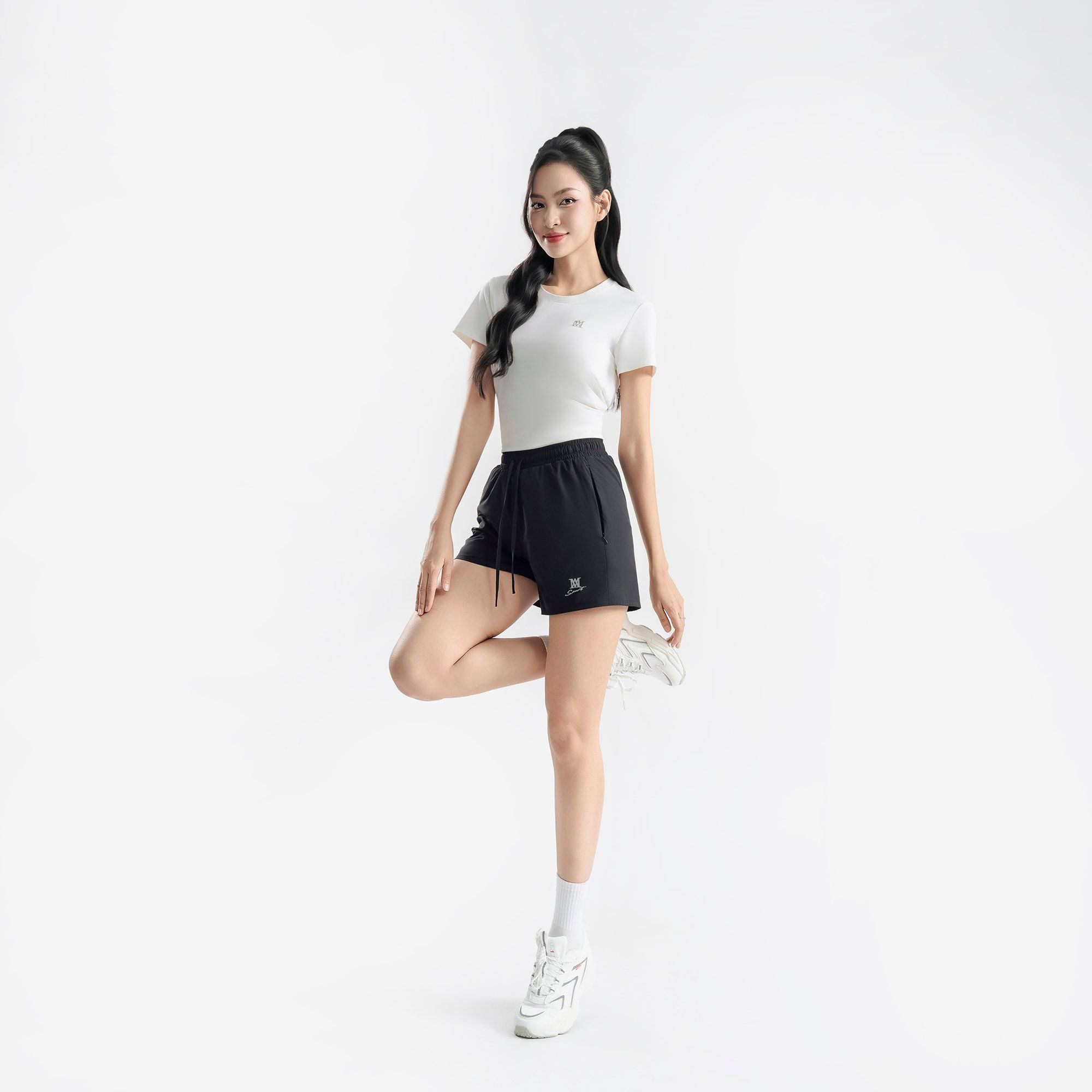  Quần running nữ AM màu đen SRW2521-00 