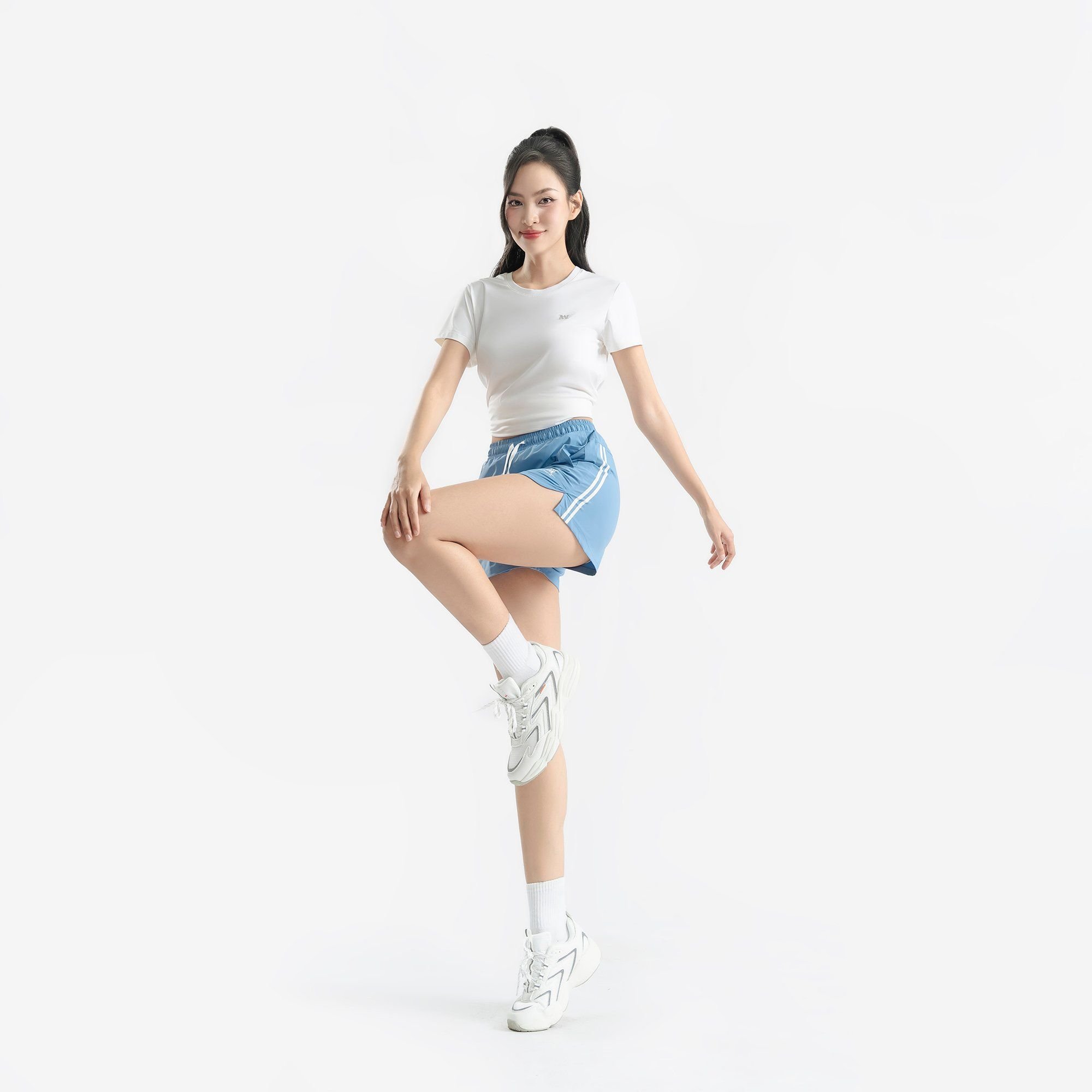  Quần running nữ AM màu xanh SRW2522-33 
