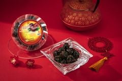 Mứt mận không hạt hộp nhựa tròn 180g