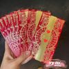 Set bao lì xì Dior đỏ họa tiết phiên bản Tết 2025