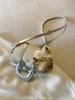 Túi trống Chio2nd kèm charm màu be phối bạc