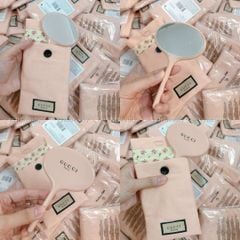 Gương Gucci hình oval kèm túi vải