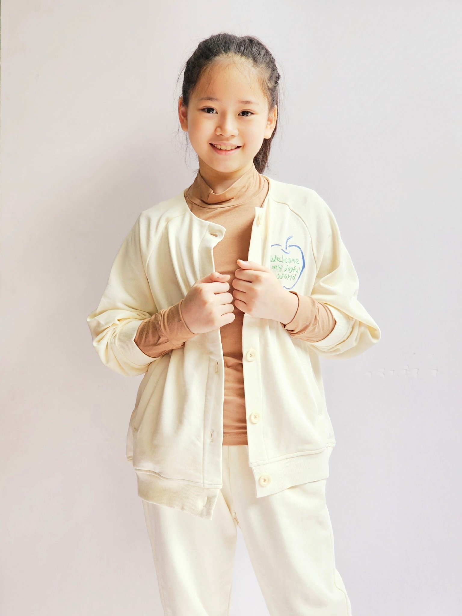 Áo khoác Cardigan nỉ da cá Nepa trắng kem ngực in hình táo size 110 - 155