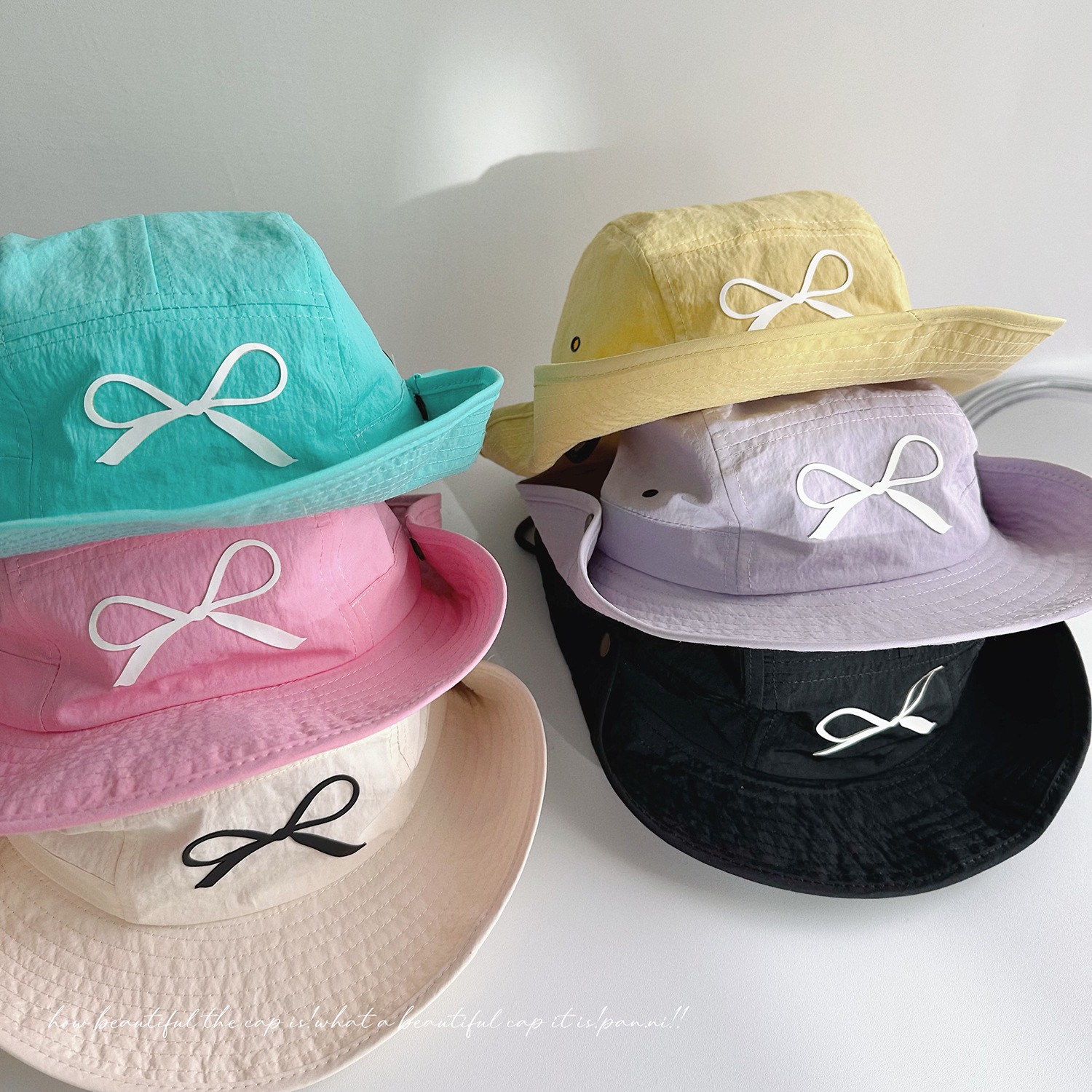 Mũ vải dù tai bèo in nơ 6 màu ( Free size 52 - 54cm )