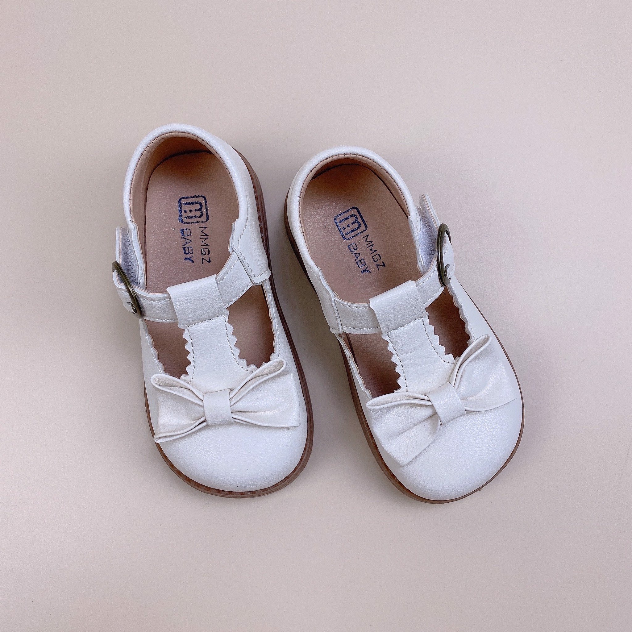 V731 - Giày MG Baby viền zíc zắc đính nơ 2 màu BG