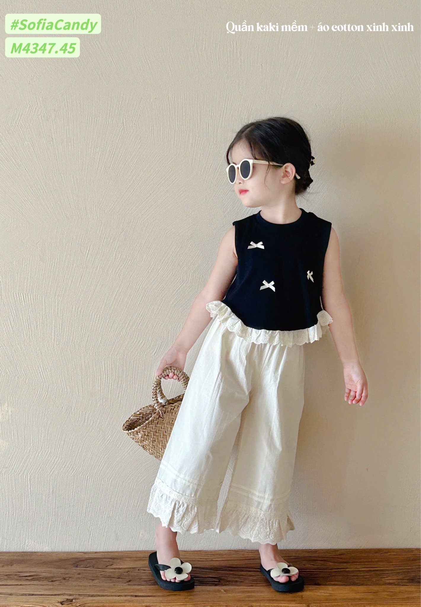 M4347 - Bộ Mia Kids tiểu thư áo đen đính nơ + quần culottes màu kem size 1-10y