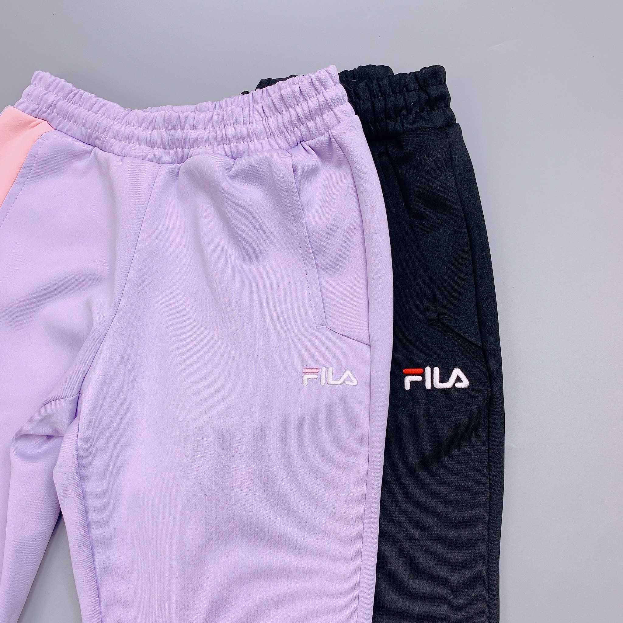 Quần nỉ Fila 2 màu tím / đen size 110 - 165