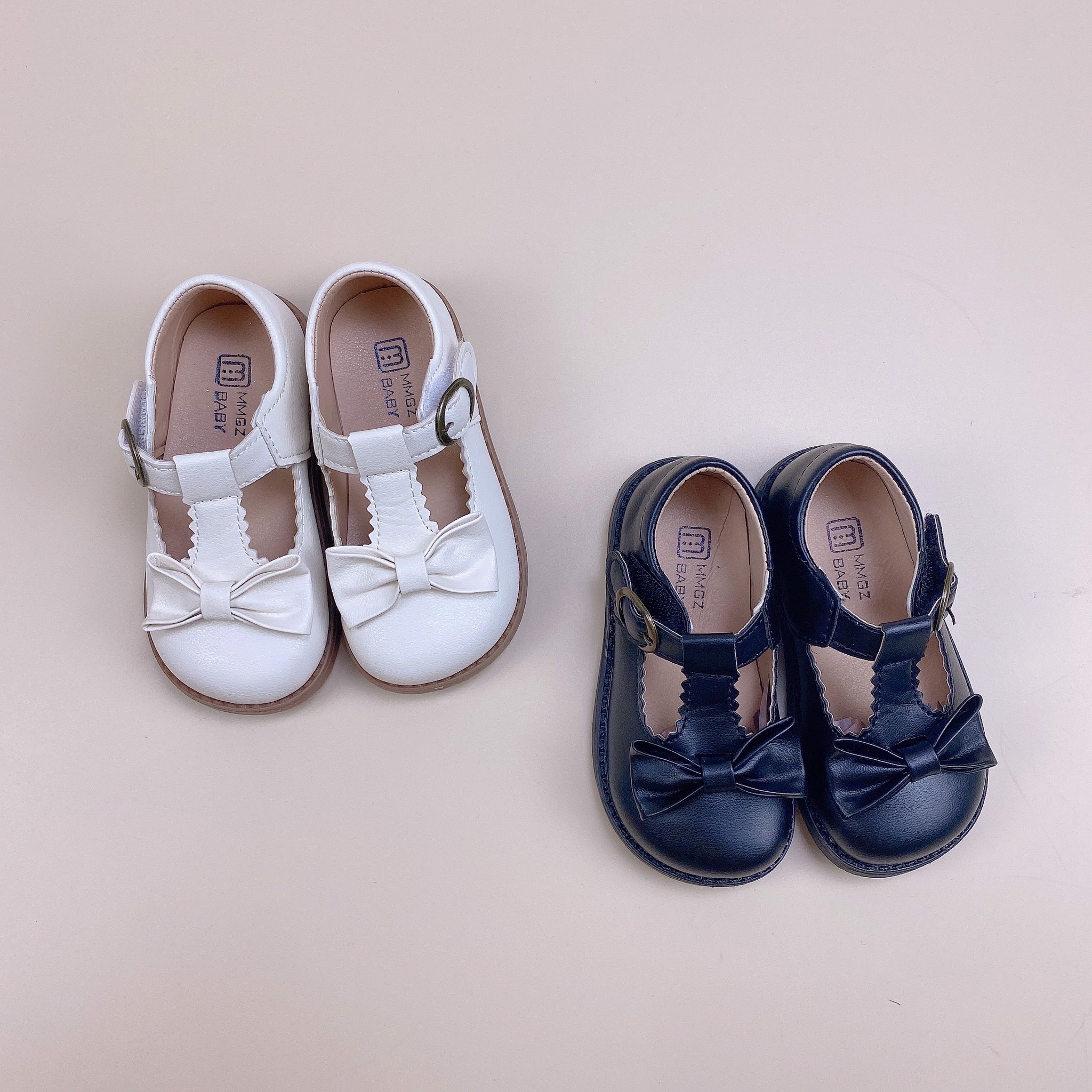 V731 - Giày MG Baby viền zíc zắc đính nơ 2 màu BG