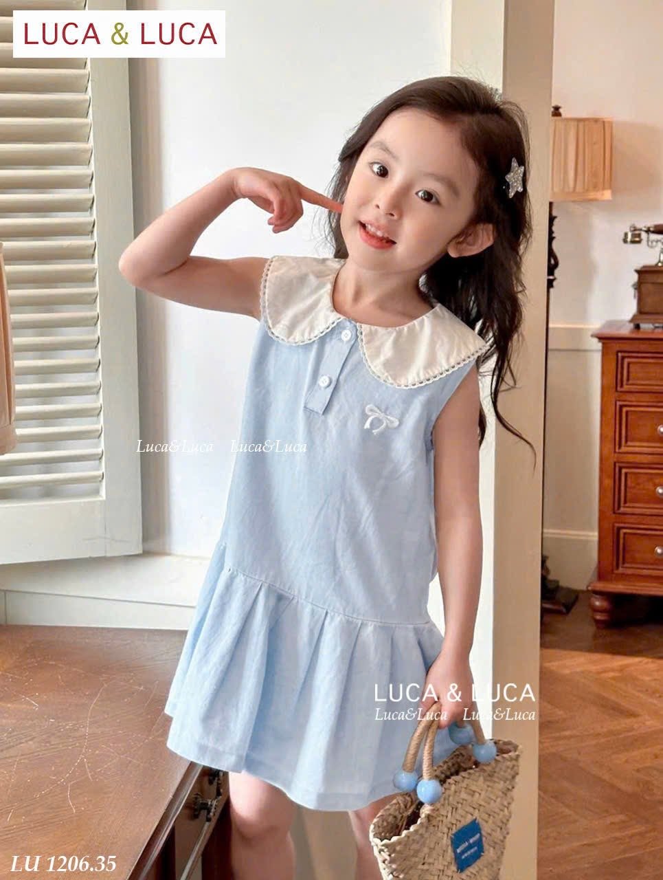 LU 1206 - Váy Luca sát nách cổ sen trắng thêu nơ ngực 2 màu hồng/xanh bé gái size 2-12y