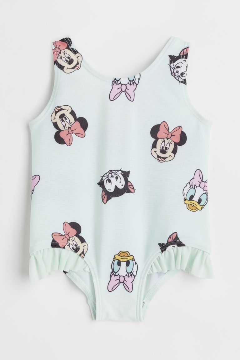 Bộ bơi HM màu xanh mint minnie in tràn BG size 3m - 4y