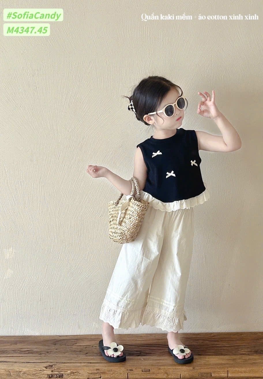 M4347 - Bộ Mia Kids tiểu thư áo đen đính nơ + quần culottes màu kem size 1-10y