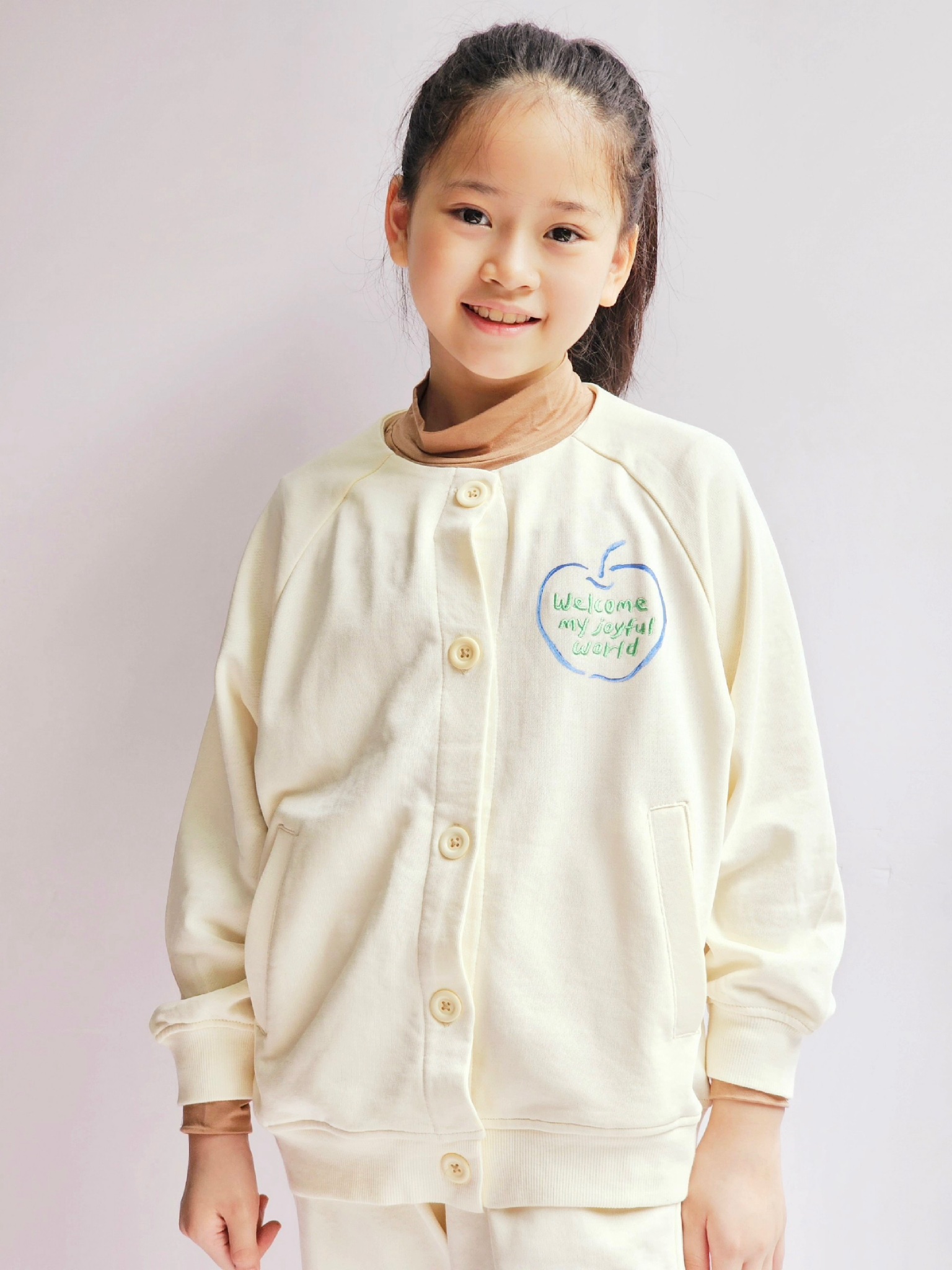 Áo khoác Cardigan nỉ da cá Nepa trắng kem ngực in hình táo size 110 - 155