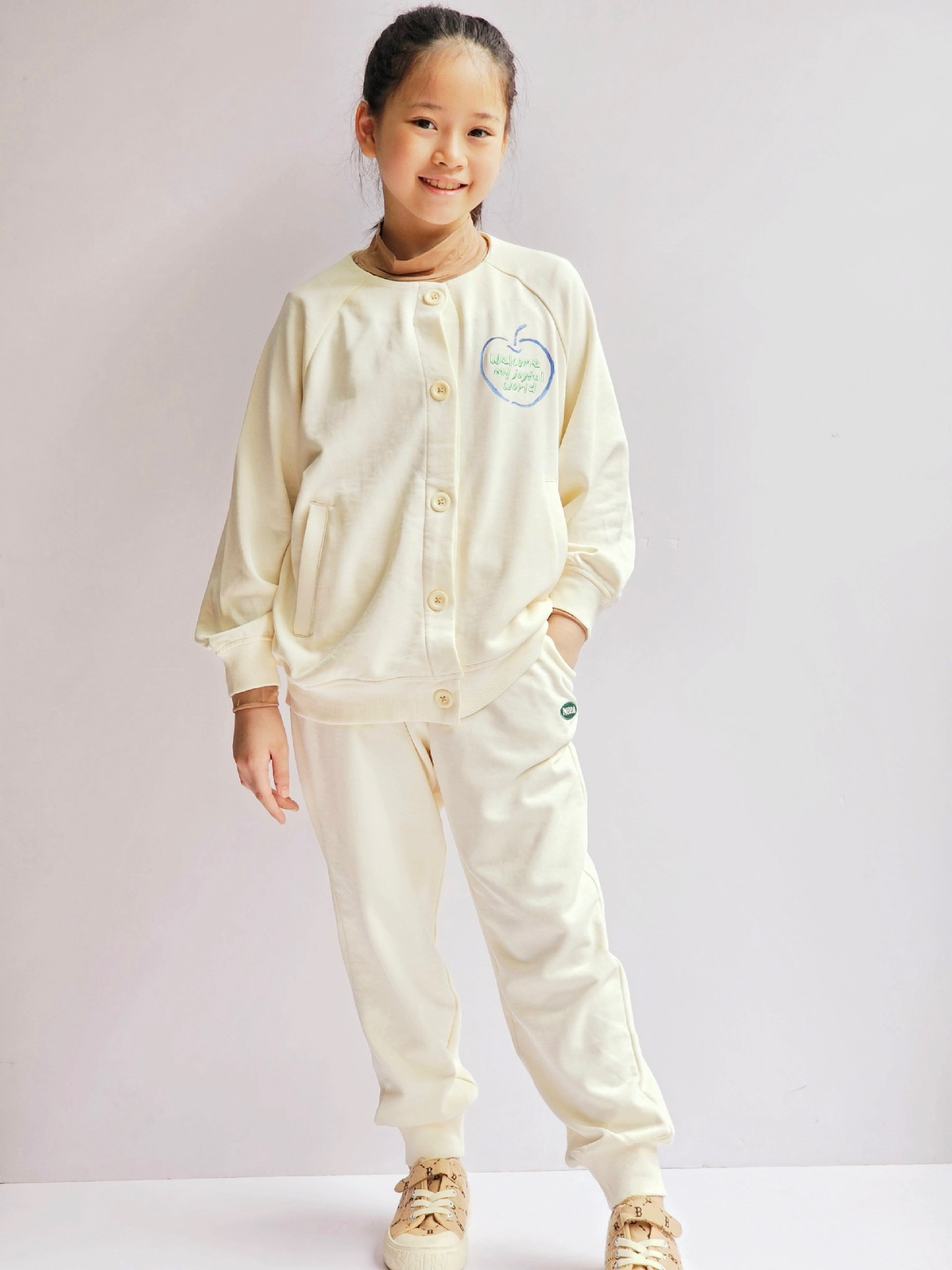 Áo khoác Cardigan nỉ da cá Nepa trắng kem ngực in hình táo size 110 - 155