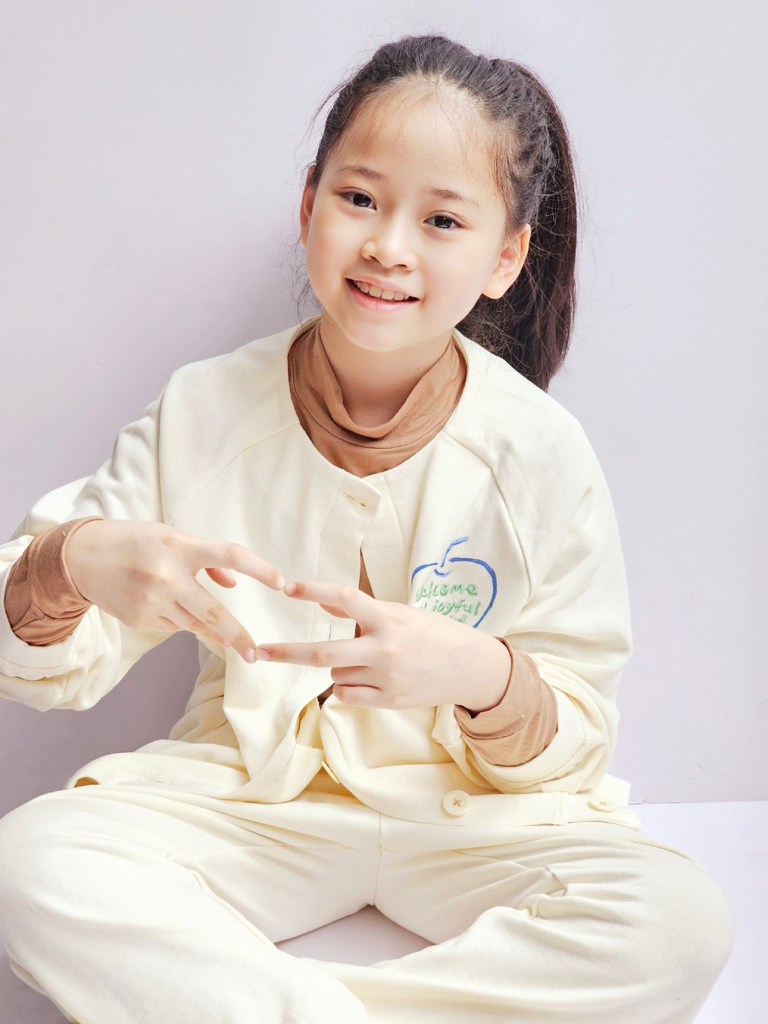 Áo khoác Cardigan nỉ da cá Nepa trắng kem ngực in hình táo size 110 - 155