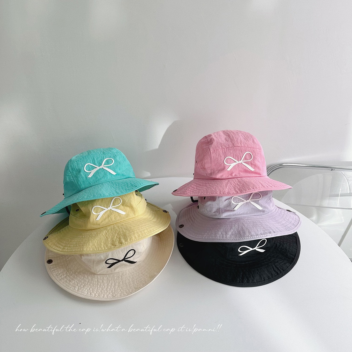 Mũ vải dù tai bèo in nơ 6 màu ( Free size 52 - 54cm )