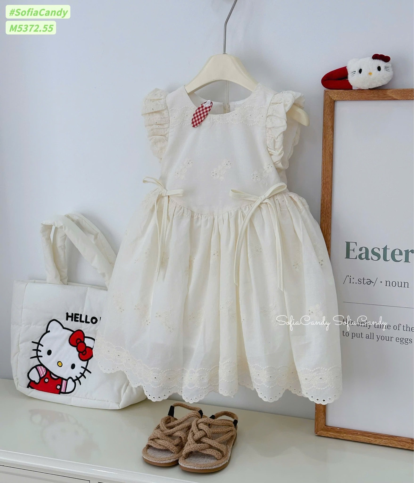 M5372 - Váy Mia Kids màu be đính nơ thêu hoa bé gái size 1-10y