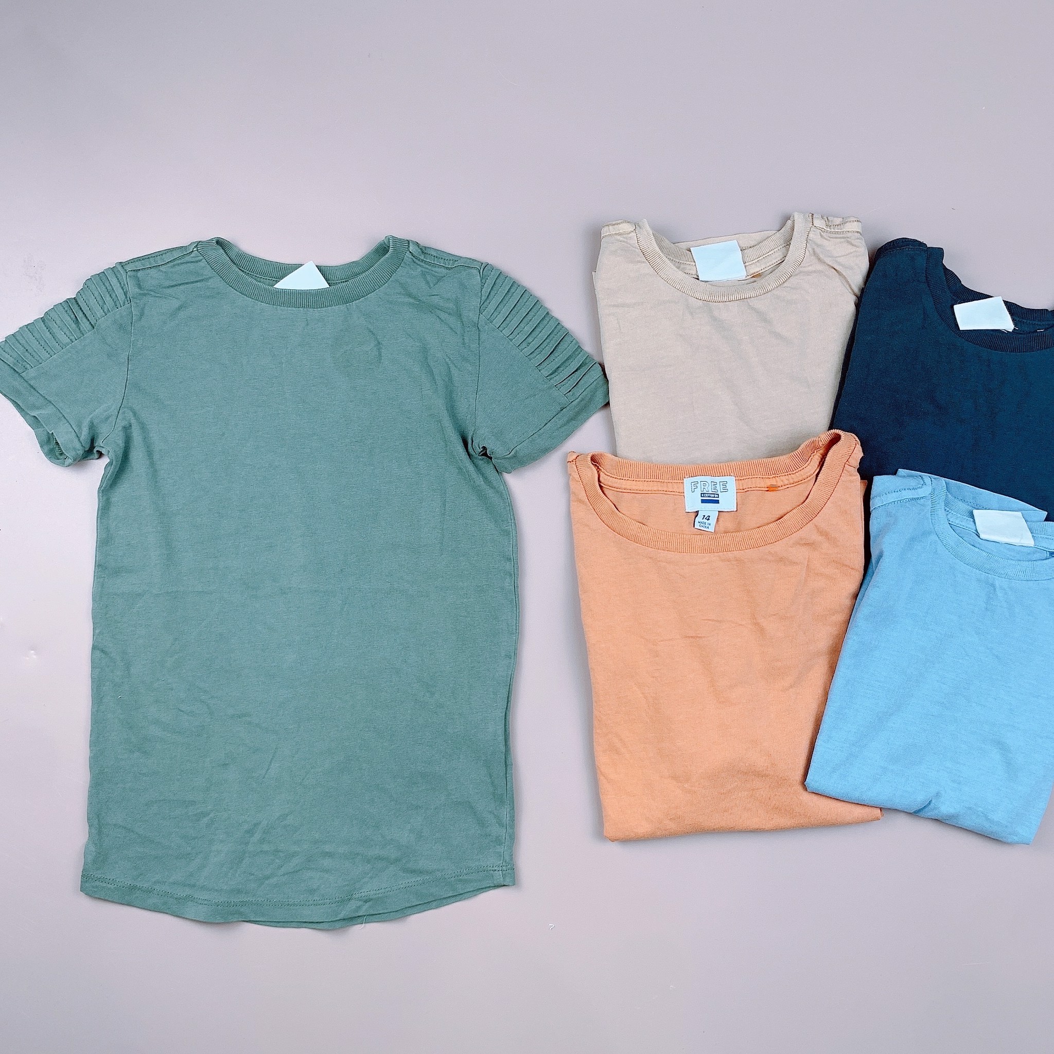 Áo cotton on bé gái dáng dài trơn nhiều màu vạt chéo
