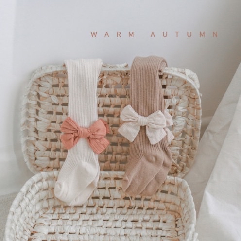 Quần tất Nemo baby đính nơ vải to BG