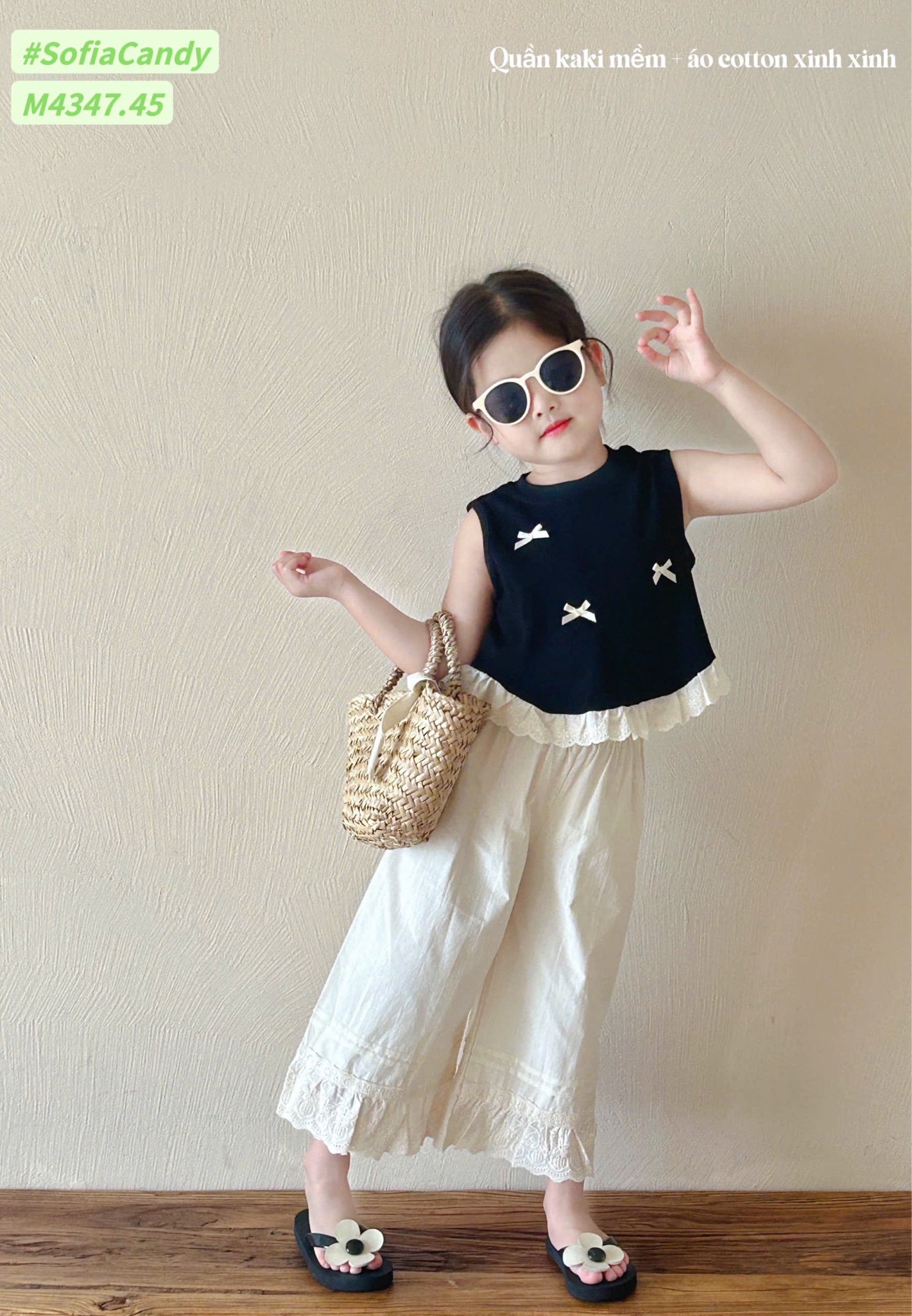 M4347 - Bộ Mia Kids tiểu thư áo đen đính nơ + quần culottes màu kem size 1-10y