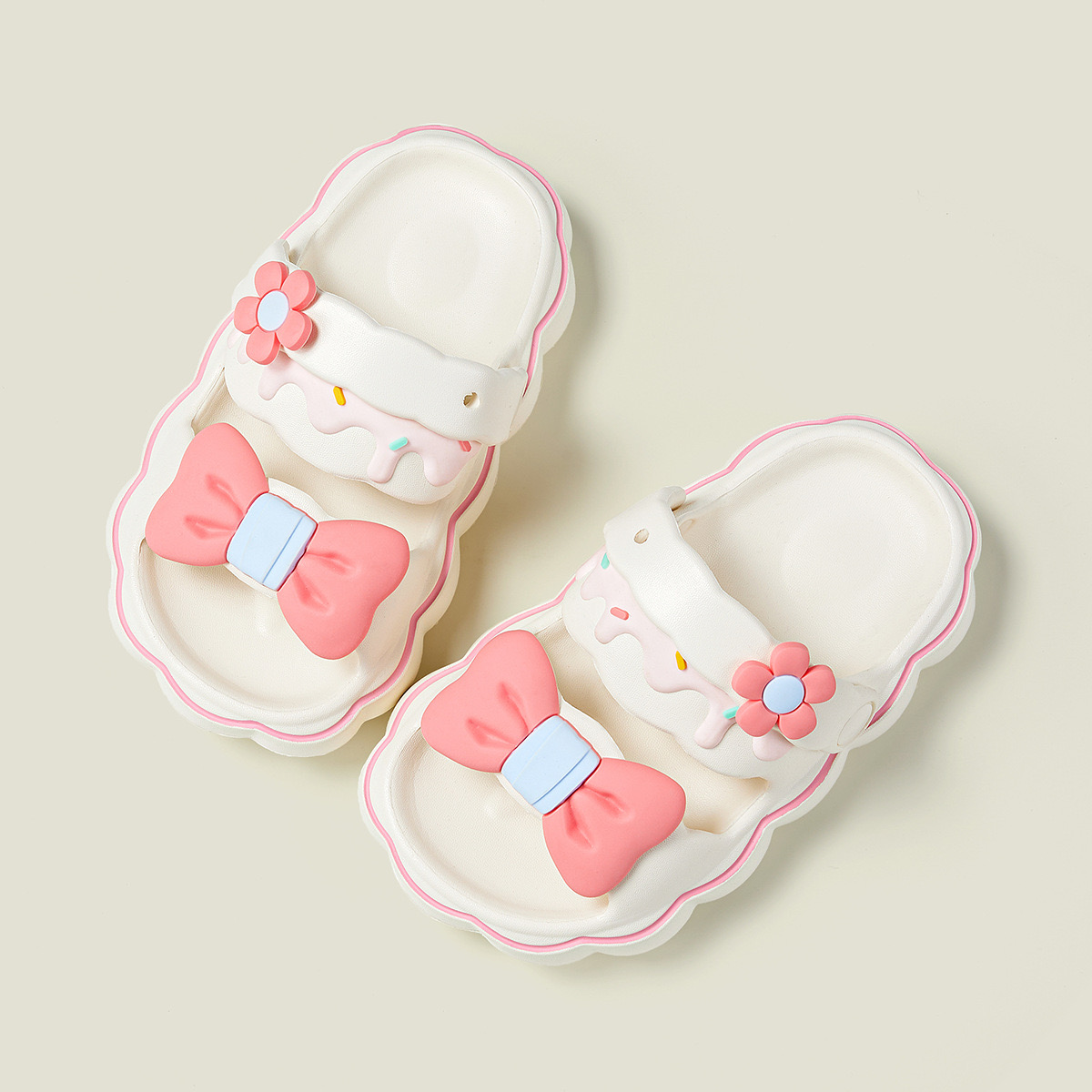 Sandal nhựa mềm Mario hoạ tiết nơ hoa 2 màu hồng/kem bé gái size 170-220